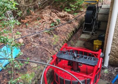 Specialist drainage equipment used for root removal in Bearsden