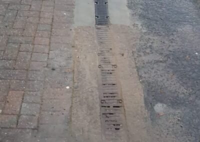 Close view of a commercial surface drainage channel before maintenance in Maryhill